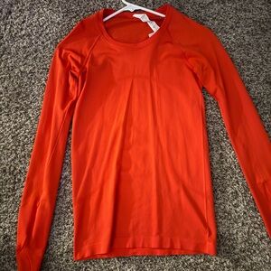 Lululemon Swiftly Tech Long Sleeve Hip Length Never